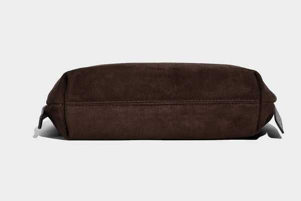 Slouchy crescent hobo shoulder bag in dark chocolate matte suede-look finish with adjustable strap and twin-pull top zip