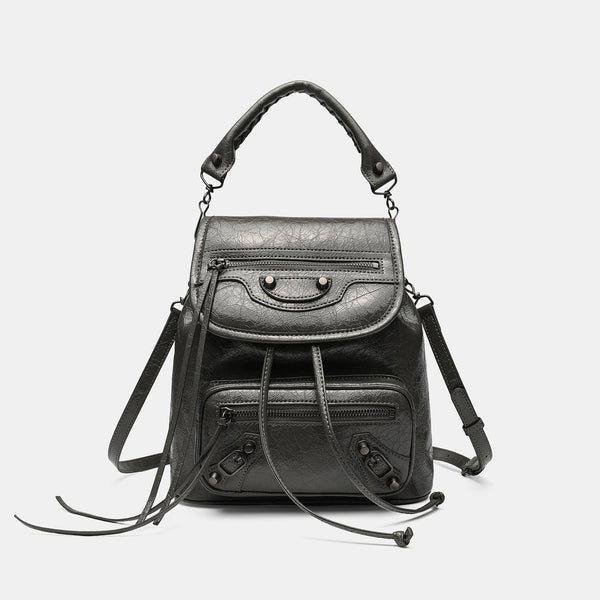 Small structured glossy leather-look convertible backpack handbag in black with flap closure, front zip pockets, metal stud