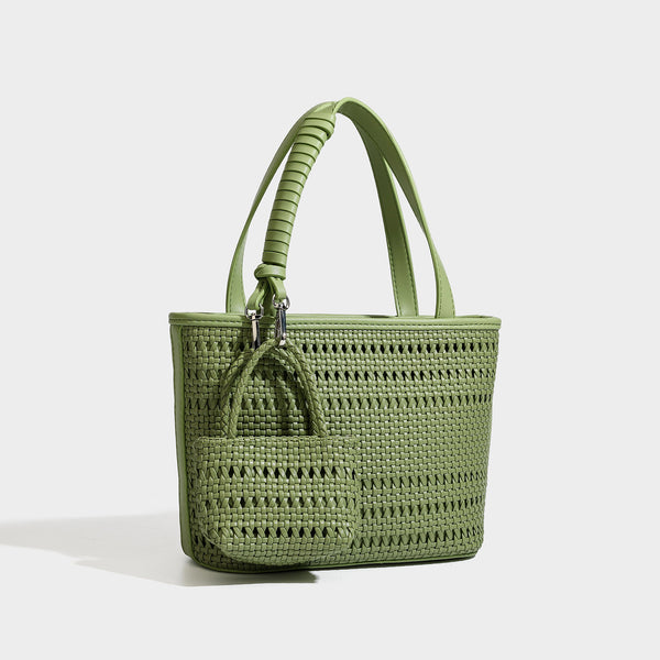 Structured open-weave tote bag with smooth leather-look trim, double top handles, detachable crossbody strap, and mini zip