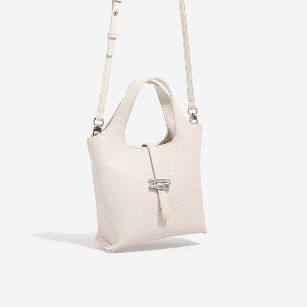 Mini pebbled leather-look bucket tote with silver toggle clasp and dual top handles, detail view 3