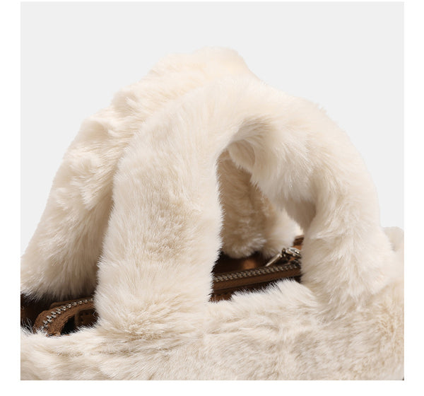 Mini structured handbag with cream faux-fur trim and suede-look textured body, shown with top handles and removable