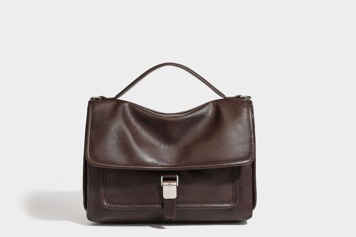 Structured rectangular satchel bag in dark espresso brown with smooth leather-look finish, flap front with silver turn-lock