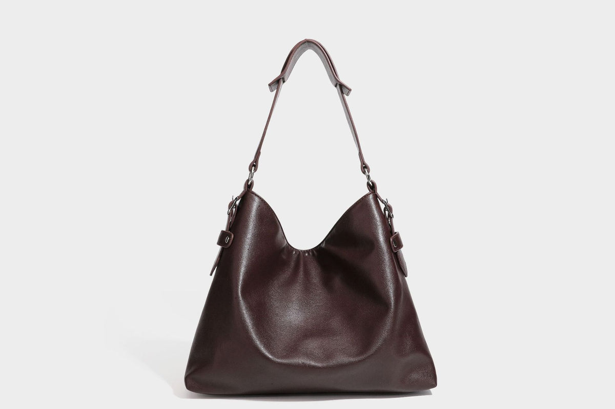 Large slouchy hobo shoulder bag in dark brown with smooth leather-look finish, adjustable strap, and silver-tone hardware