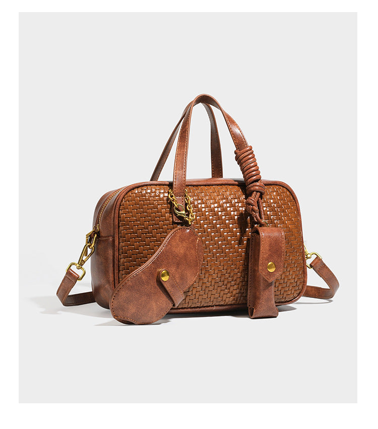 Strukturierte rechteckige Satchel-Tasche mit gewebtem Vorderteil in Lederoptik, goldfarbenen Details, zwei Tragegriffen und abnehmbarem