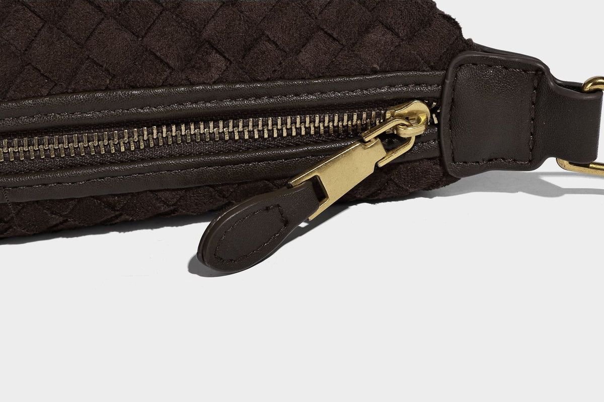 Small woven-texture crescent hobo bag in dark chocolate brown with top zip closure, gold-tone hardware, and adjustable