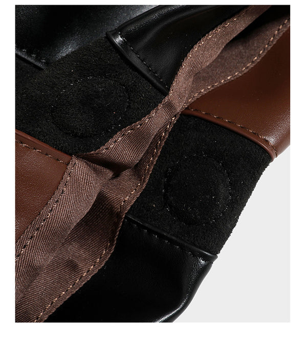 Two-tone black and brown leather-look slouchy shoulder bag with beaded tassel charm and silver-tone hardware, detail view 18