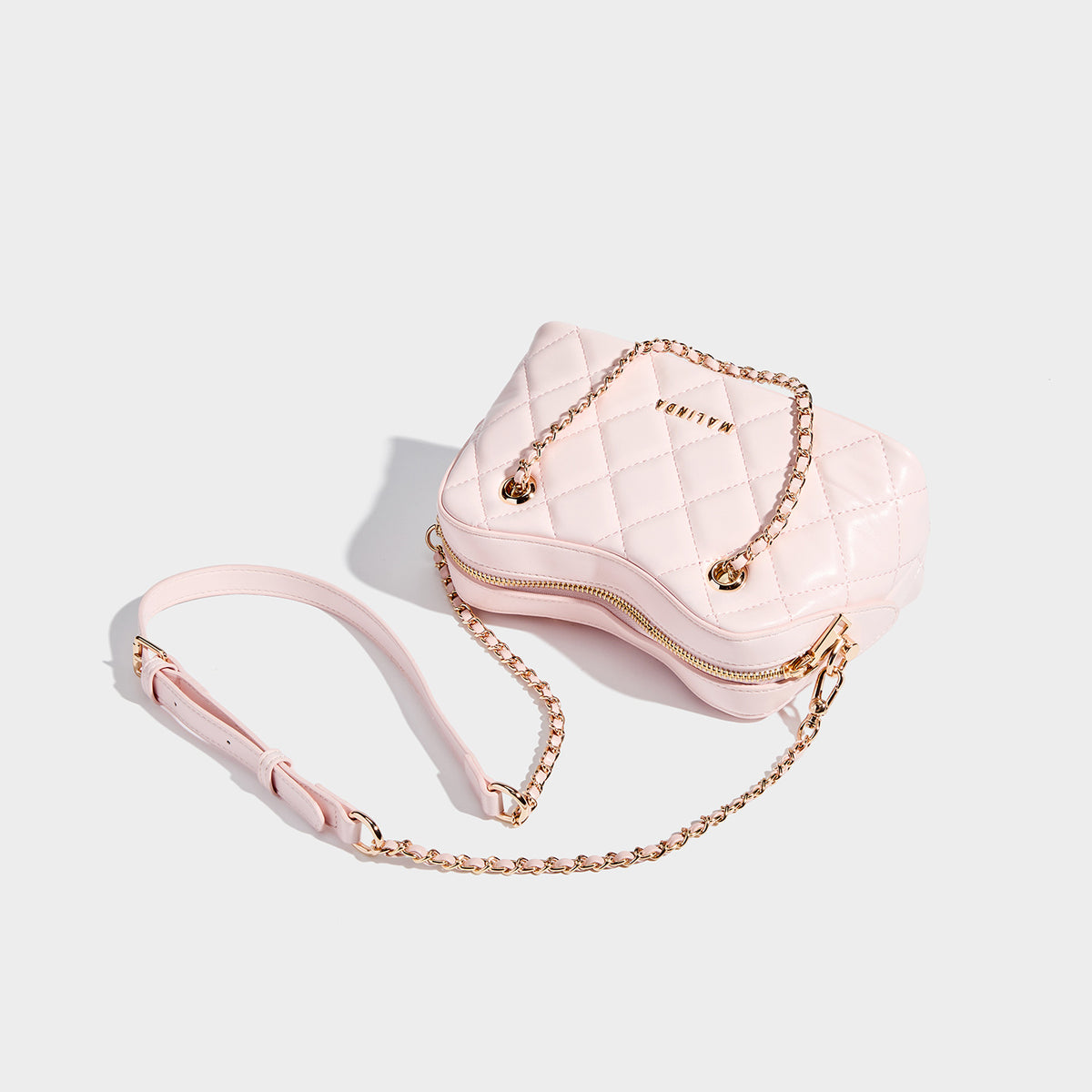 Diamond-quilted mini shoulder bag with gold-tone chain strap and top zip closure, detail view 4