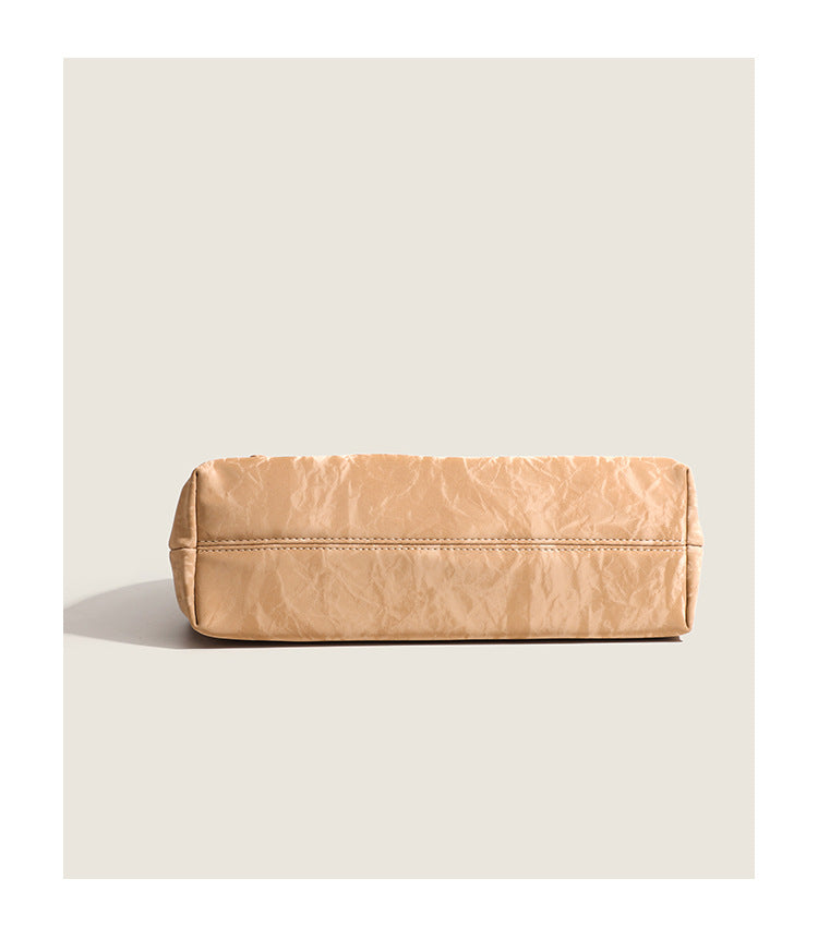 Crinkle-finish leather-look shoulder bag with woven tan-and-metal chain strap and front flap turn-lock closure, detail view 8