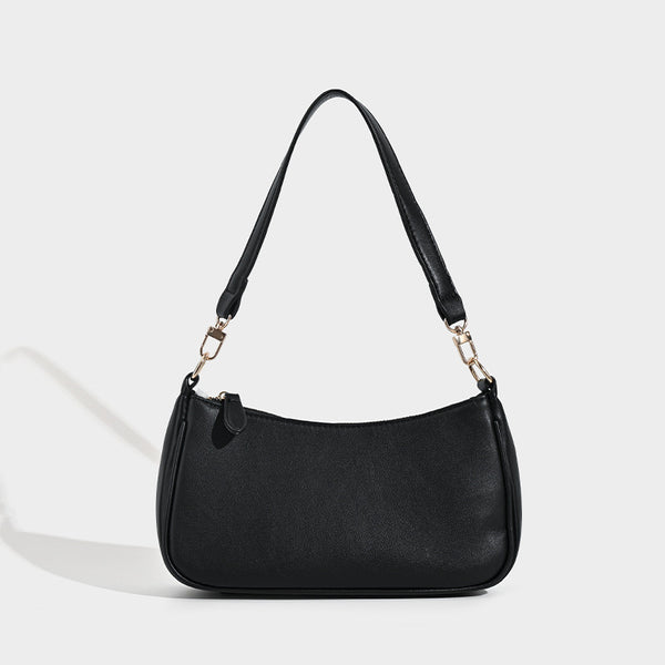 Kompakte Baguette-Schultertasche mit bogenförmiger Silhouette, strukturierter Oberfläche in Lederoptik und goldfarbenen Metalldetails, Detailansicht 6