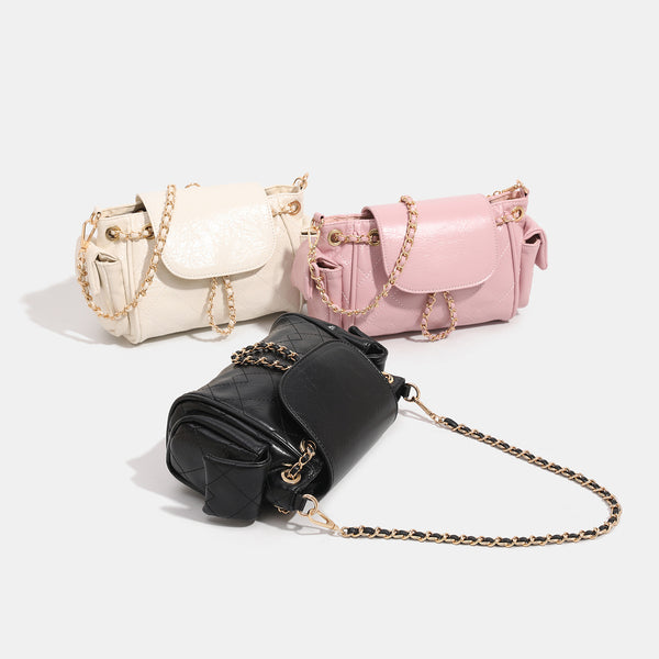Small quilted leather-look flap bag with gold-tone chain strap and diamond stitch pattern, detail view 2