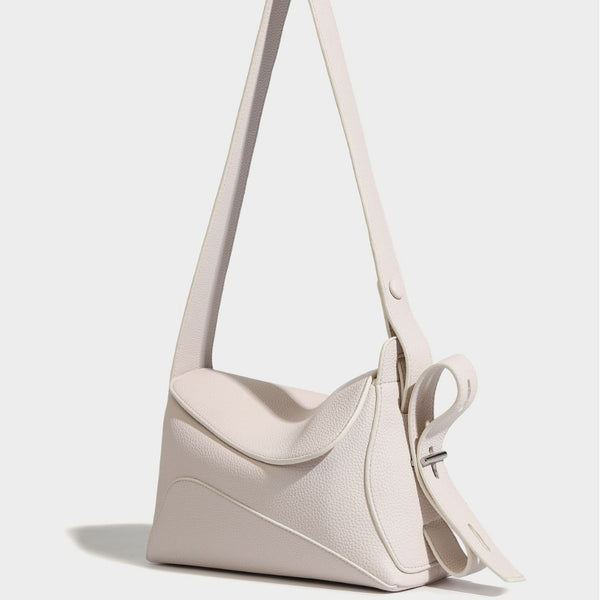 Structured curved-flap pebbled PU shoulder bag with sculptural loop strap detail, detail view 4