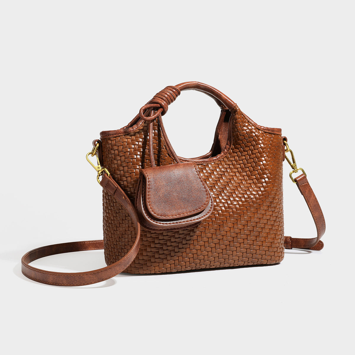 Woven leather-look tote bag in mocha brown with knotted top handle, front flap pocket, and detachable crossbody strap with