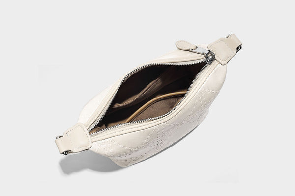 Small embossed half-moon shoulder bag with top zipper, detachable front pouch, and adjustable slim strap, detail view 18