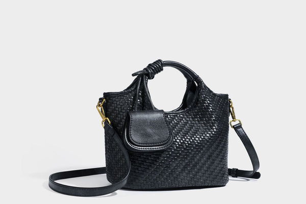 Woven leather-look tote bag in mocha brown with knotted top handle, front flap pocket, and detachable crossbody strap with