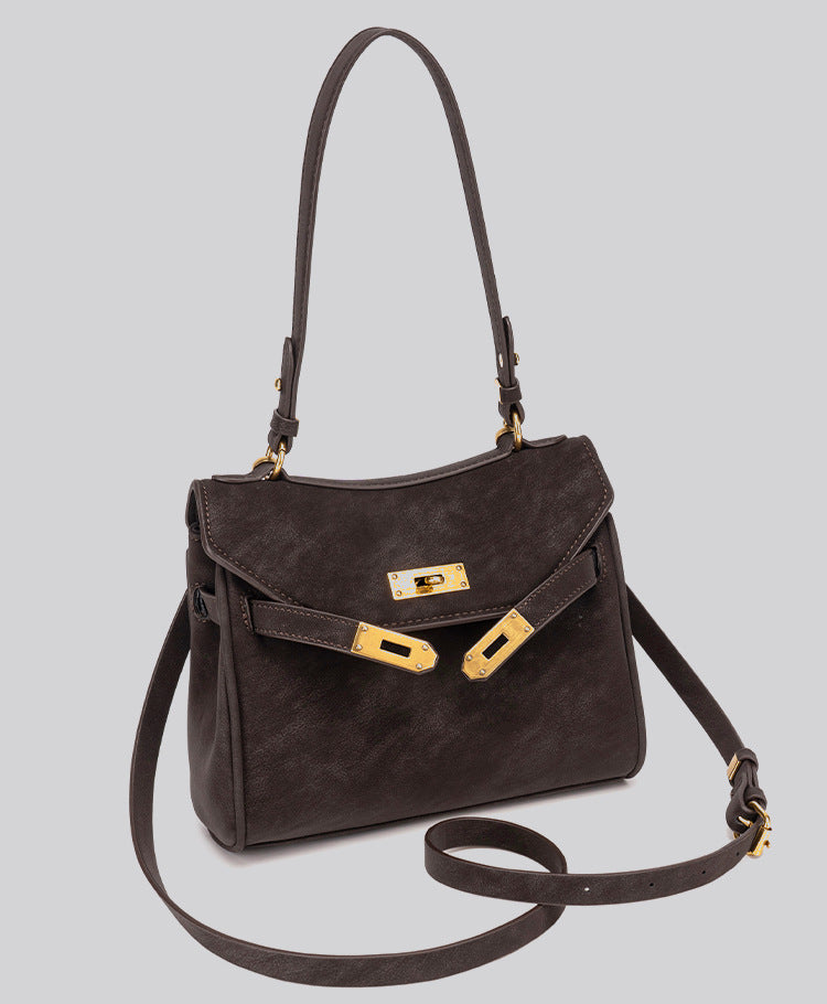 Structured dark brown flap satchel with gold-tone turn-lock hardware and detachable shoulder strap, detail view 17