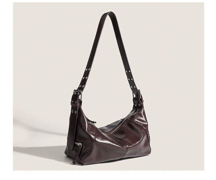 Glossy crinkled mini hobo shoulder bag with studded adjustable strap and silver-tone hardware, detail view 19