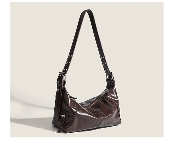 Glossy crinkled mini hobo shoulder bag with studded adjustable strap and silver-tone hardware, detail view 19