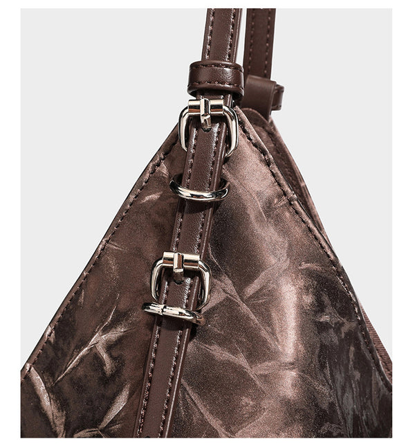 Slouchy crinkle-finish shoulder tote bag with silver hardware and attached zip pouch, detail view 16