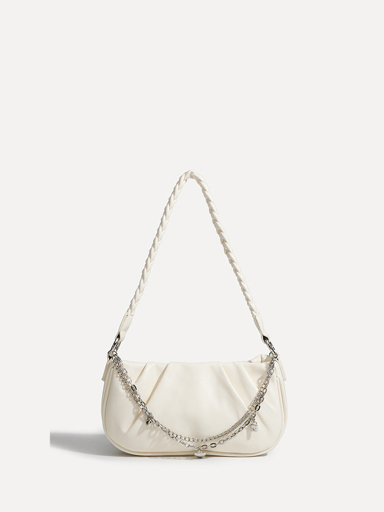 Slouchy hobo shoulder bag with gathered leather-look panels, silver-tone chain with charm pendants, and braided strap, detail