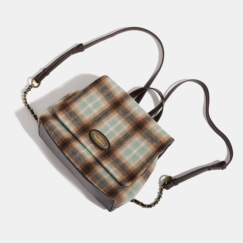 Structured plaid wool-blend flap backpack handbag in khaki sage and brown check with dark leather-look straps and antique