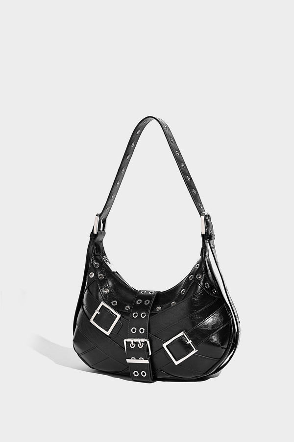 Glossy crescent hobo bag with silver-tone grommets, square buckle straps, and top zipper closure, detail view 17