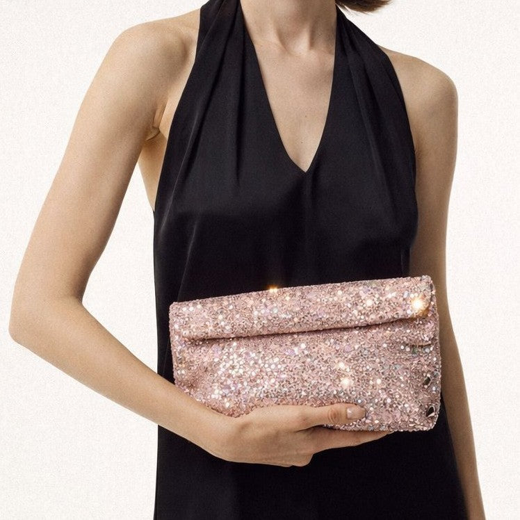 Crystal-embellished foldover clutch bag with foldover flap closure and detachable chain strap, front view