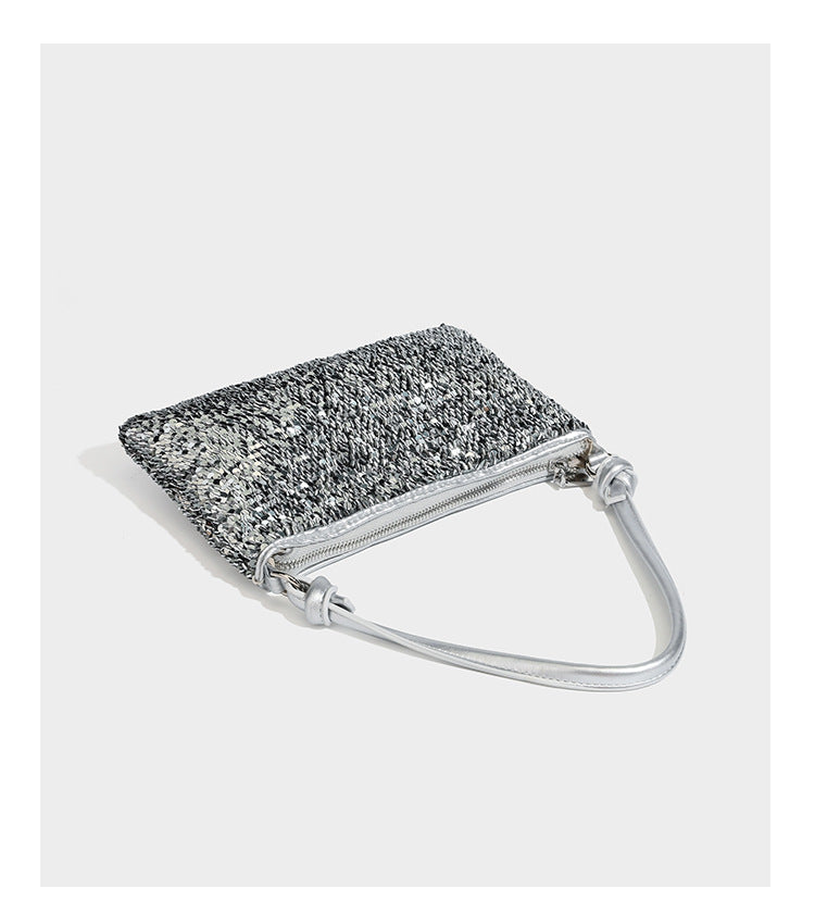Small sequin hobo shoulder bag with knotted strap and zip closure, detail view 16