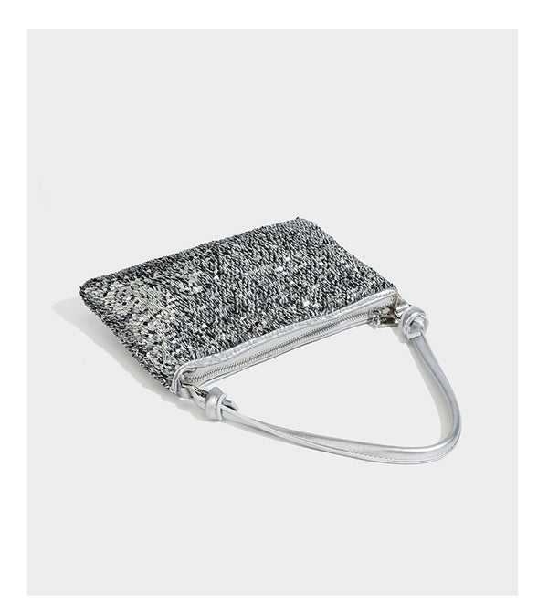 Small sequin hobo shoulder bag with knotted strap and zip closure, detail view 16