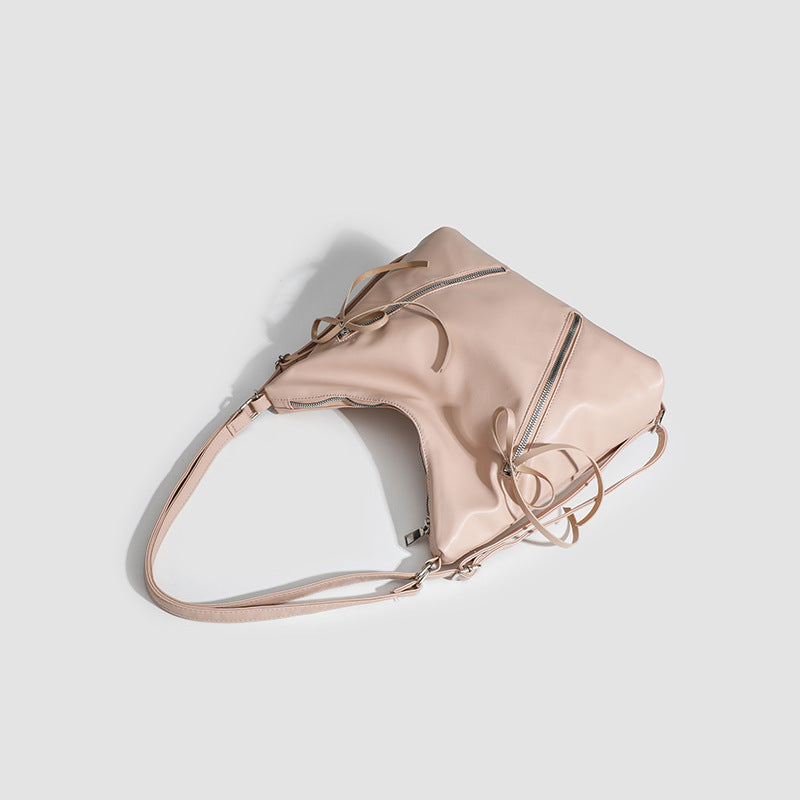 Slouchy hobo shoulder bag with bow detail and silver-tone hardware, detail view 4