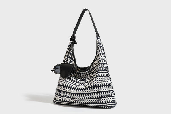 Slouchy woven stripe hobo shoulder bag with black-and-white pattern and leather-look strap, detail view 27