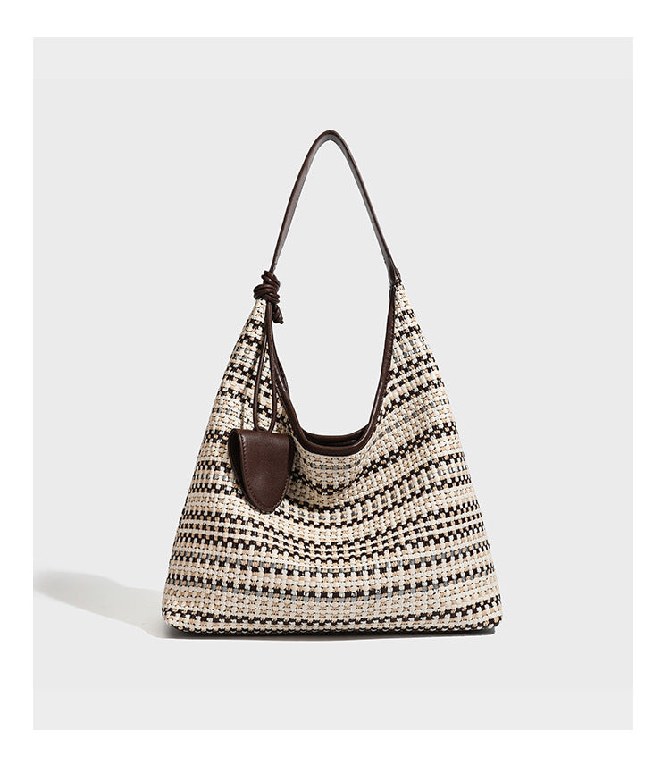 Slouchy woven stripe hobo shoulder bag with black-and-white pattern and leather-look strap, detail view 14