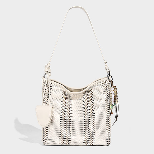 Woven bucket shoulder bag with leather-look trim, silver-tone hardware, and beaded tassel charm, detail view 3