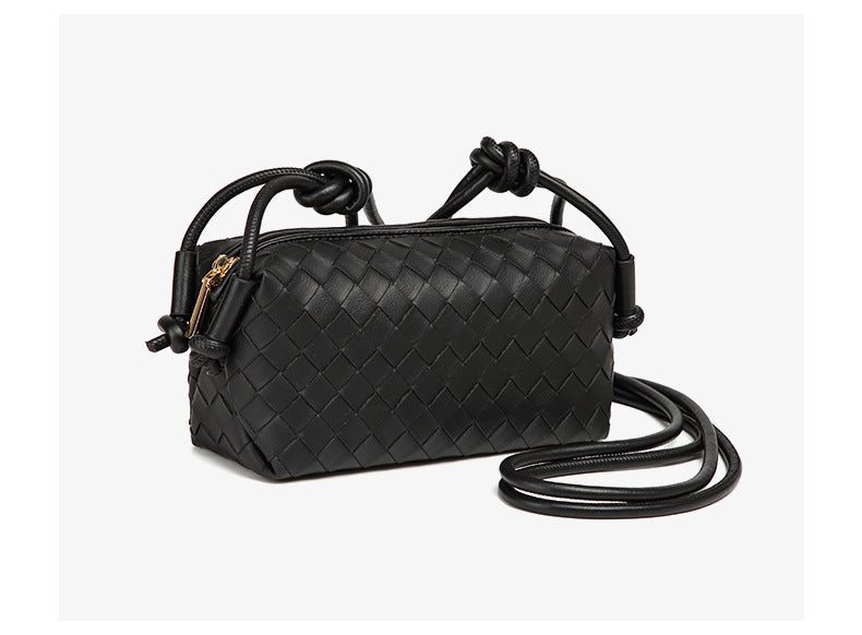 Small rectangular woven-texture mini crossbody bag with knotted rope strap and gold-tone zip closure, detail view 13