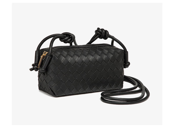 Small rectangular woven-texture mini crossbody bag with knotted rope strap and gold-tone zip closure, detail view 13