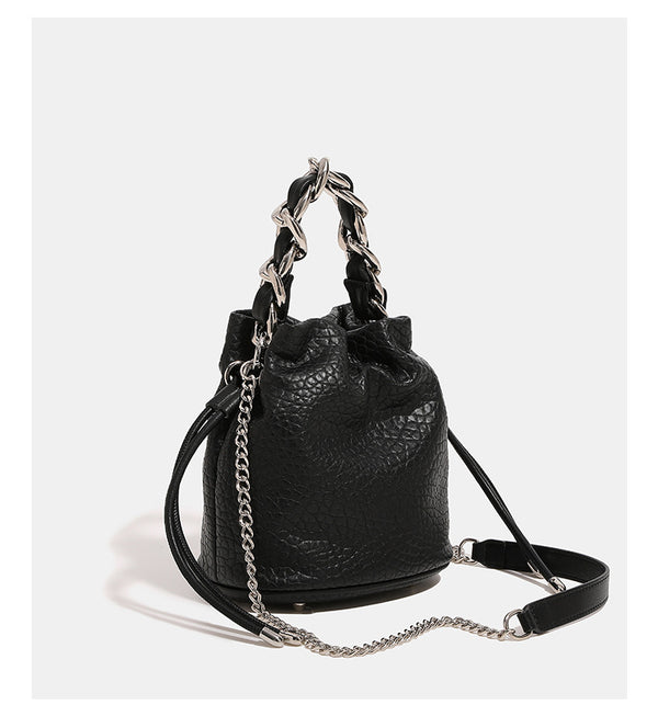 Mini pebbled leather-look bucket bag with chunky silver-tone chain handle and drawstring closure, detail view 9