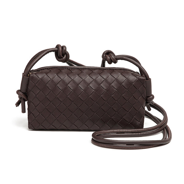 Small rectangular woven-texture mini crossbody bag with knotted rope strap and gold-tone zip closure, detail view 7