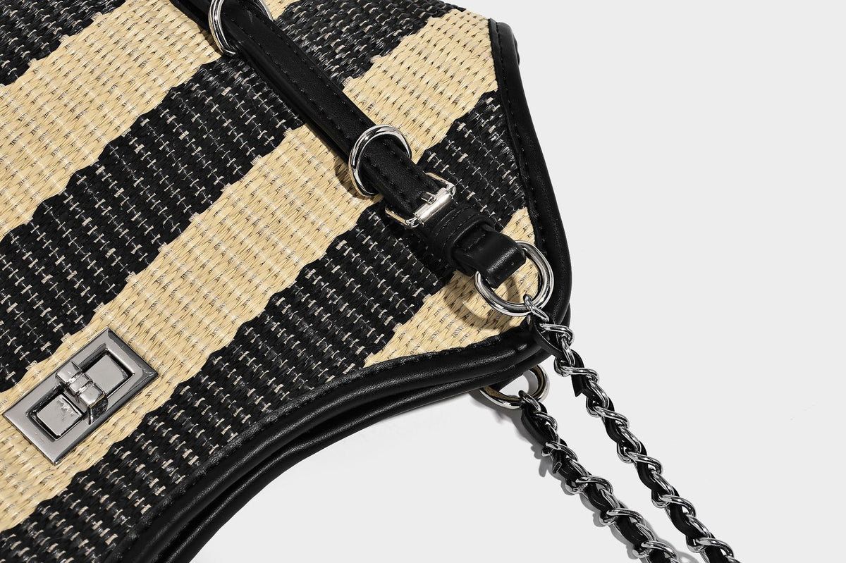 Black and natural striped woven tote bag with chain shoulder strap and silver-tone turn-lock hardware, detail view 21
