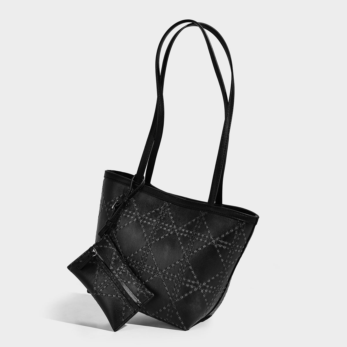 Quilted diamond-pattern tote bag with attached front zip pouch and long shoulder straps, detail view 4