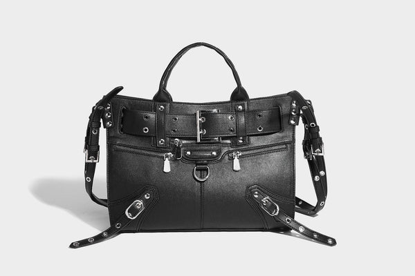 Black structured rectangular satchel bag with silver-tone rivets, large front buckle strap, zip pockets, dual top handles