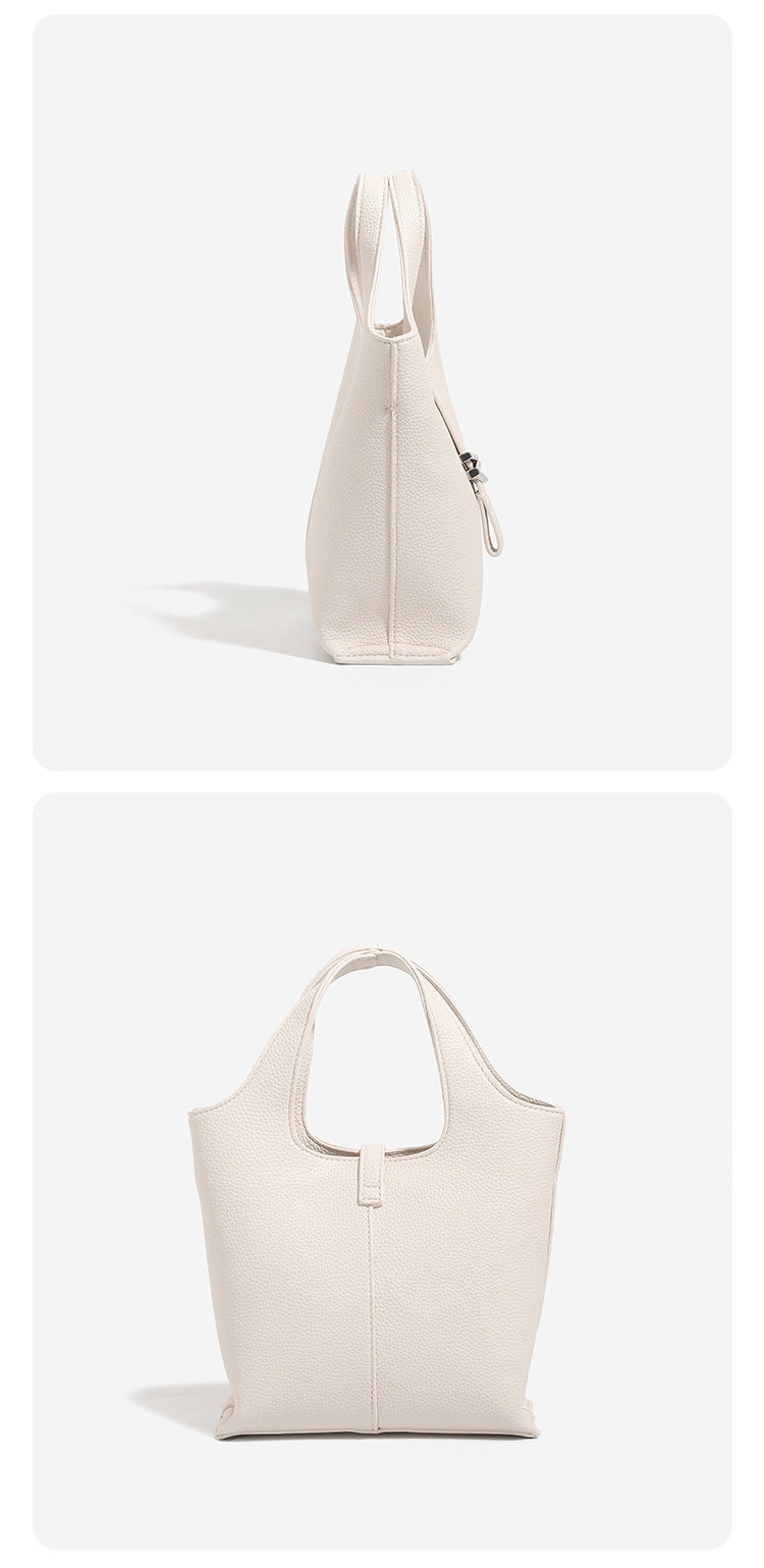 Mini pebbled leather-look bucket tote with silver toggle clasp and dual top handles, detail view 16