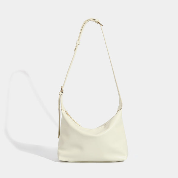 Soft slouchy zip shoulder crossbody bag with smooth matte leather-look finish and gold-tone hardware, detail view 7