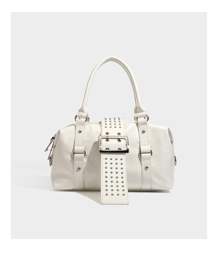 Glossy crinkled barrel handbag with silver stud buckle strap and detachable shoulder strap, detail view 14