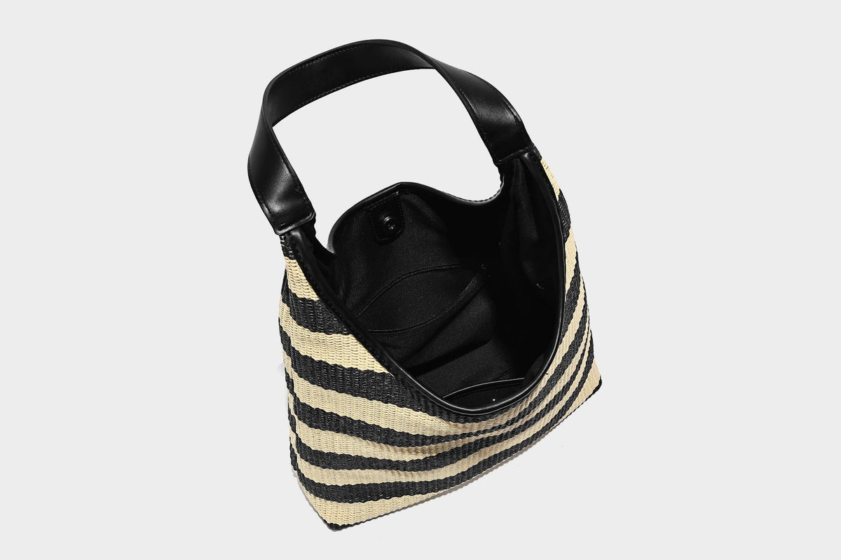 Black and beige striped woven shoulder tote bag with leather-look trim and detachable black zip pouch, detail view 22