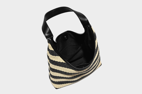 Black and beige striped woven shoulder tote bag with leather-look trim and detachable black zip pouch, detail view 22