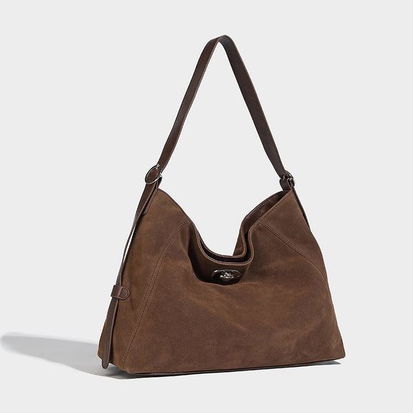 Slouchy hobo shoulder bag with turn-lock flap closure and adjustable strap, detail view 19
