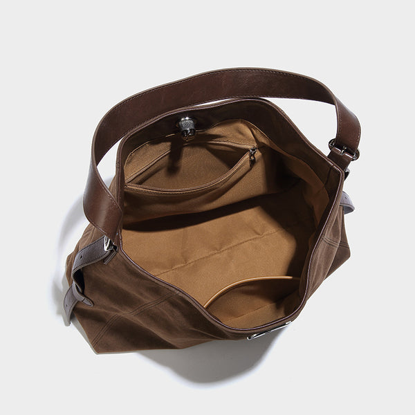 Slouchy hobo shoulder bag with turn-lock flap closure and adjustable strap, detail view 32