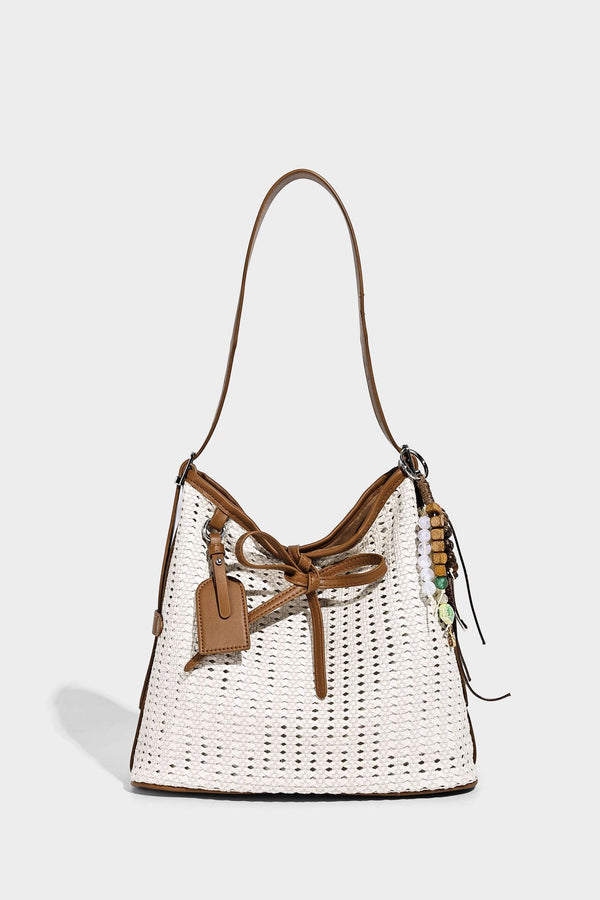 Slouchy open-weave shoulder tote bag with leather-look tan trim, tie-front closure, and long adjustable strap, detail view 8
