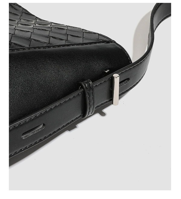 Large black bucket shoulder bag with diamond woven leather-look front panel, smooth side panels, magnetic snap closure, and