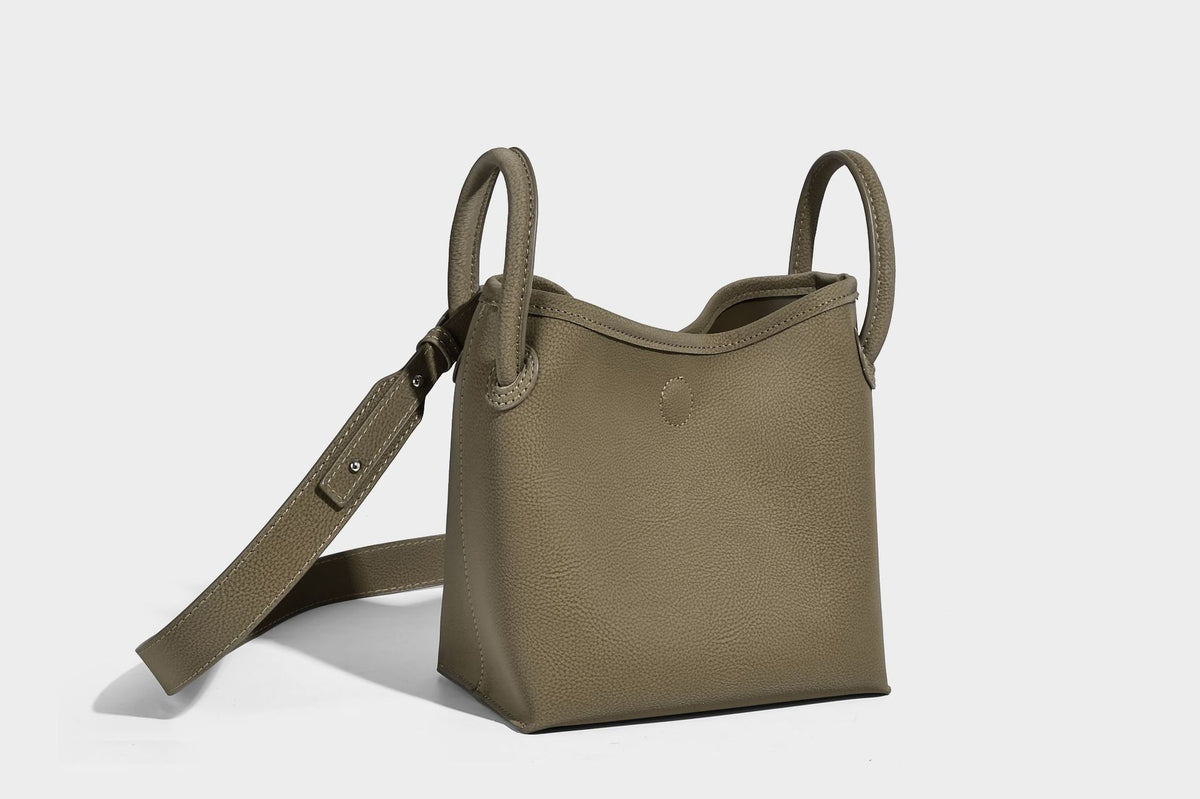 Small structured matte pebbled tote bag with twin top handles and removable zip pouch, detail view 32