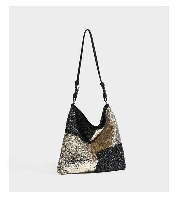 Lässig-weicher Patchwork-Schultershopper mit Pailletten, schwarz-goldenen oder creme-silbernen Colorblocking-Einsätzen und verstellbarem, schmalem Riemen